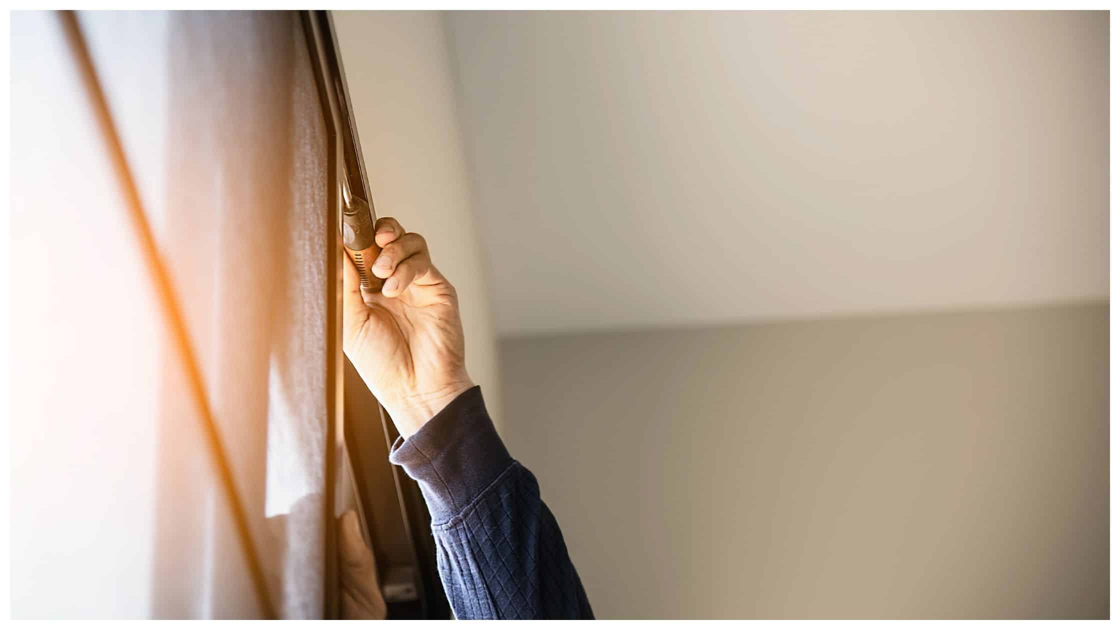 Worker Installing Window Screen 